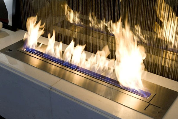Fire coming through modern fireplace