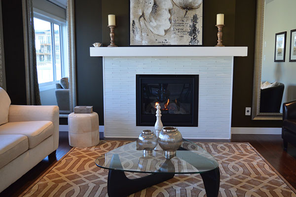 Living room with a white fireplace